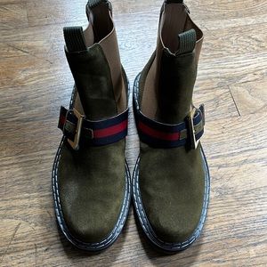 Olive green suede Cecelia NY lug sole boots w/blue & red belts.